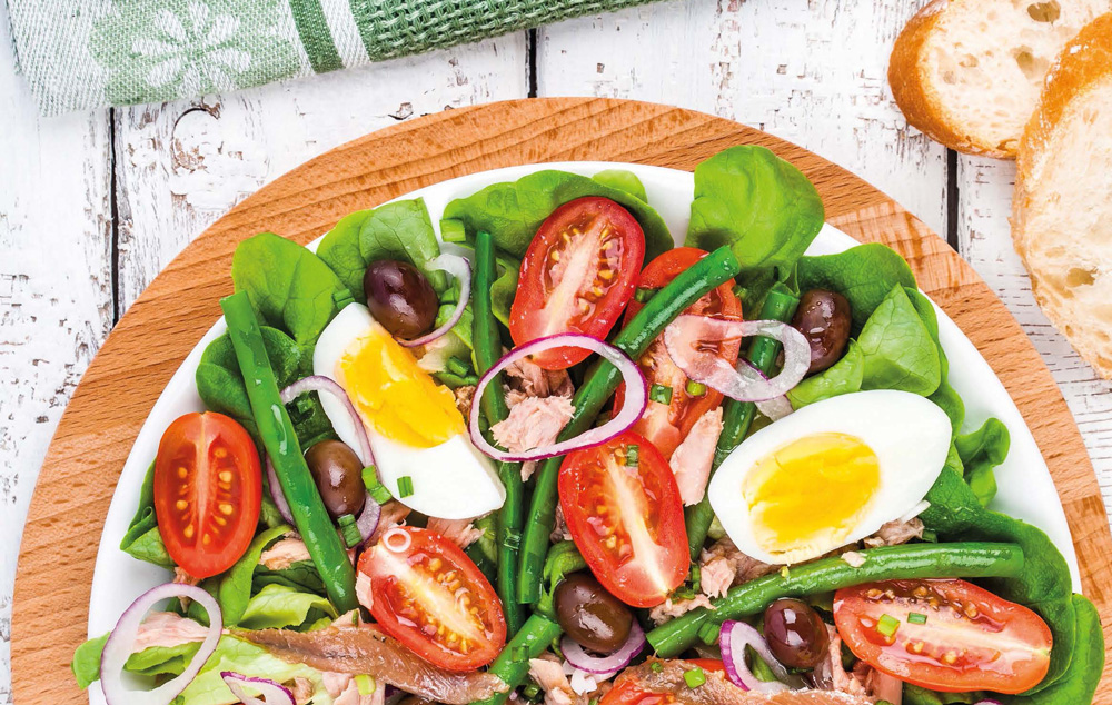 Salad nicoise with eggs and tomatoes